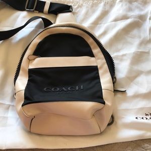 Coach two-tone sling backpack